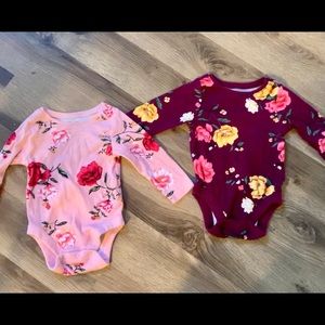Two Old Navy Long sleeve floral onesies size 0-3mo